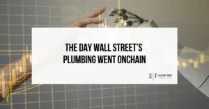 Human and robotic hands reaching toward each other over financial charts, with the headline “The Day Wall Street’s Plumbing Went Onchain.”