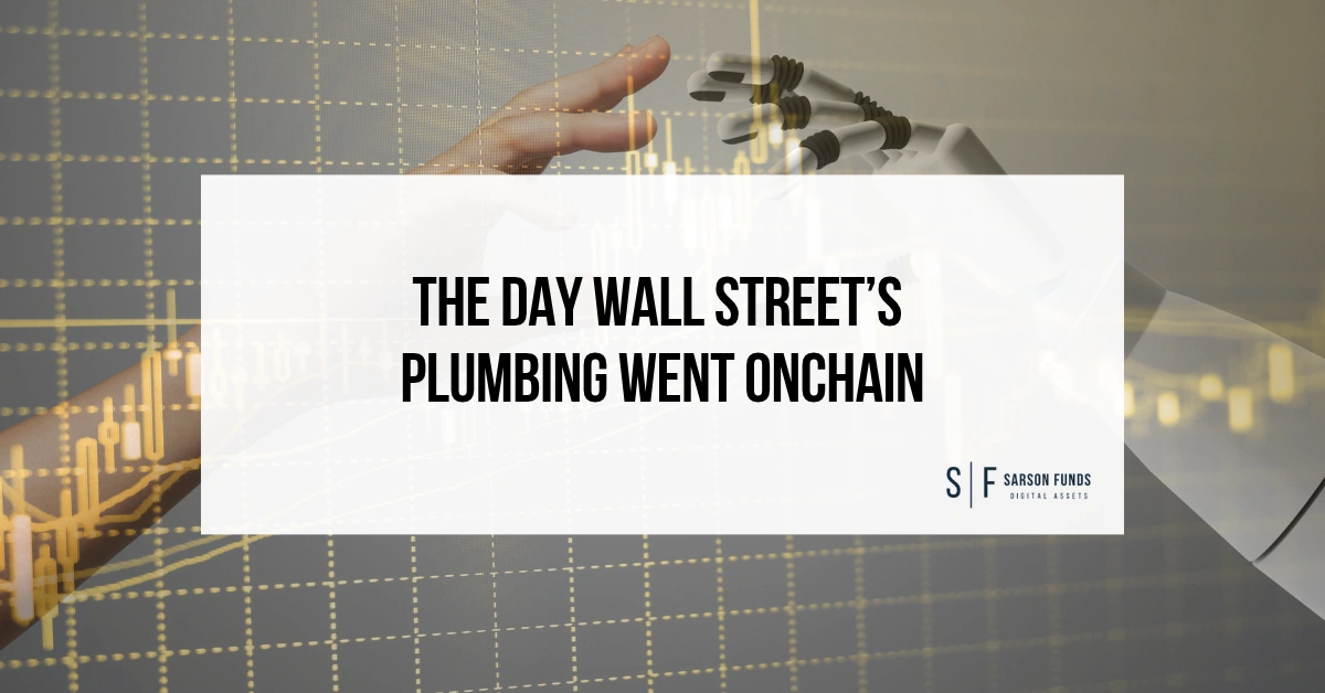 Human and robotic hands reaching toward each other over financial charts, with the headline “The Day Wall Street’s Plumbing Went Onchain.”